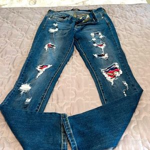 Judy Blue serape distressed jeans.